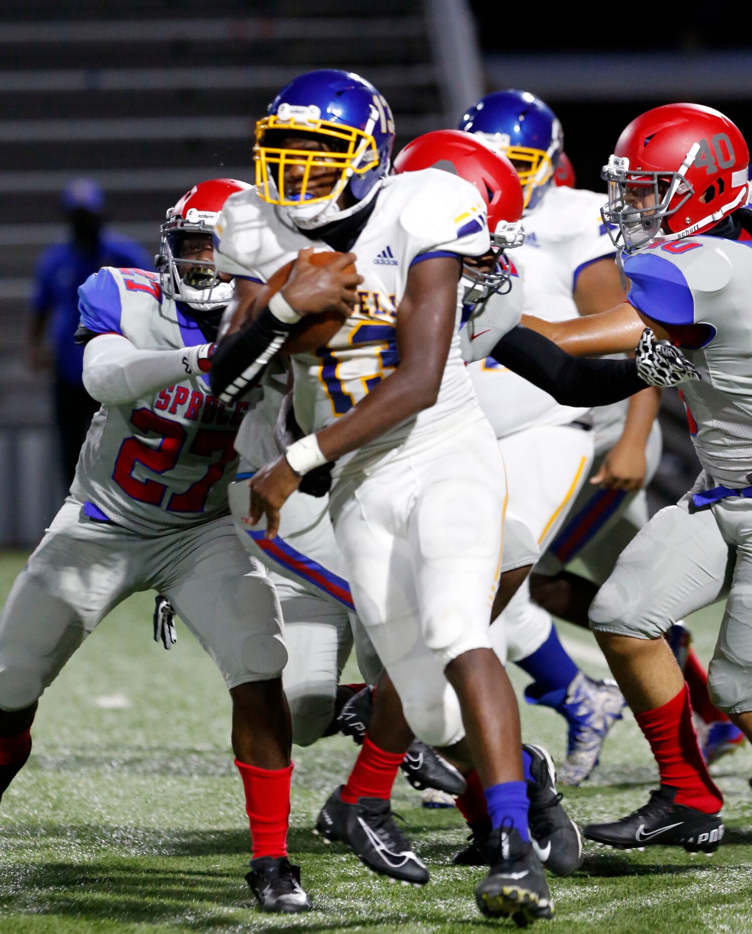 Samuell’s De’Quan’Dre Brown (13) picks up a couple of yards during the first half of the...