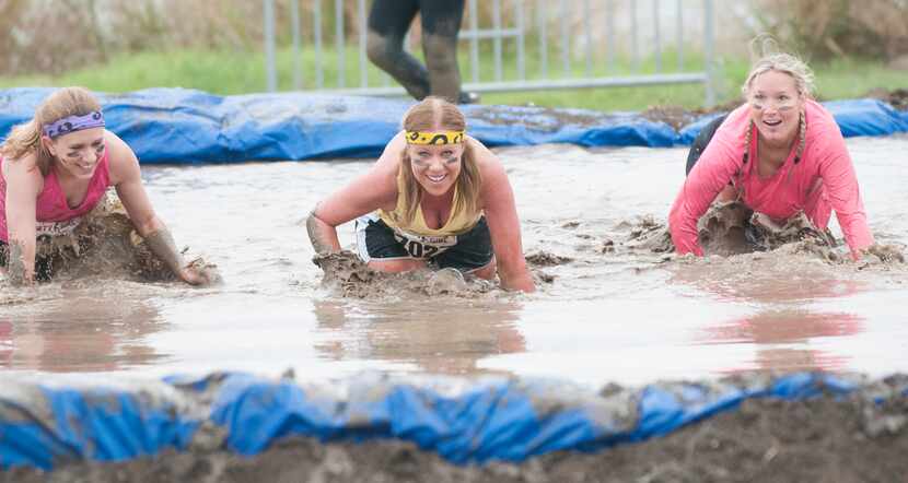 Women competing in the Dirty Girl Mud Run at Cedar Hill State Park on Saturday, Oct. 6, 2012. 
