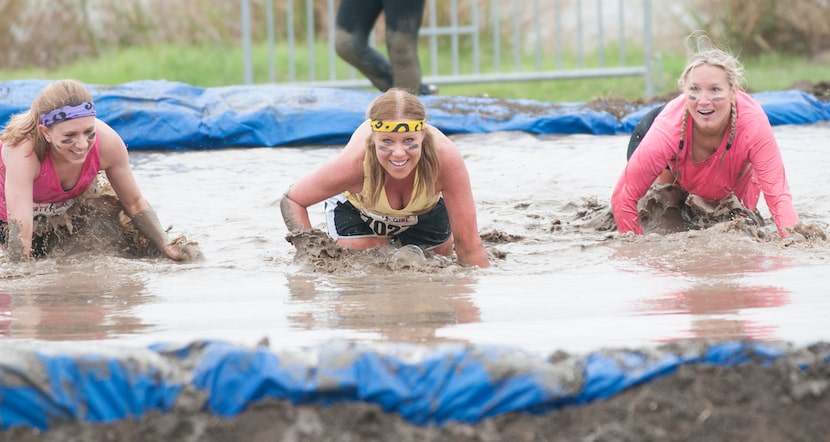 Women competing in the Dirty Girl Mud Run at Cedar Hill State Park on Saturday, Oct. 6, 2012. 