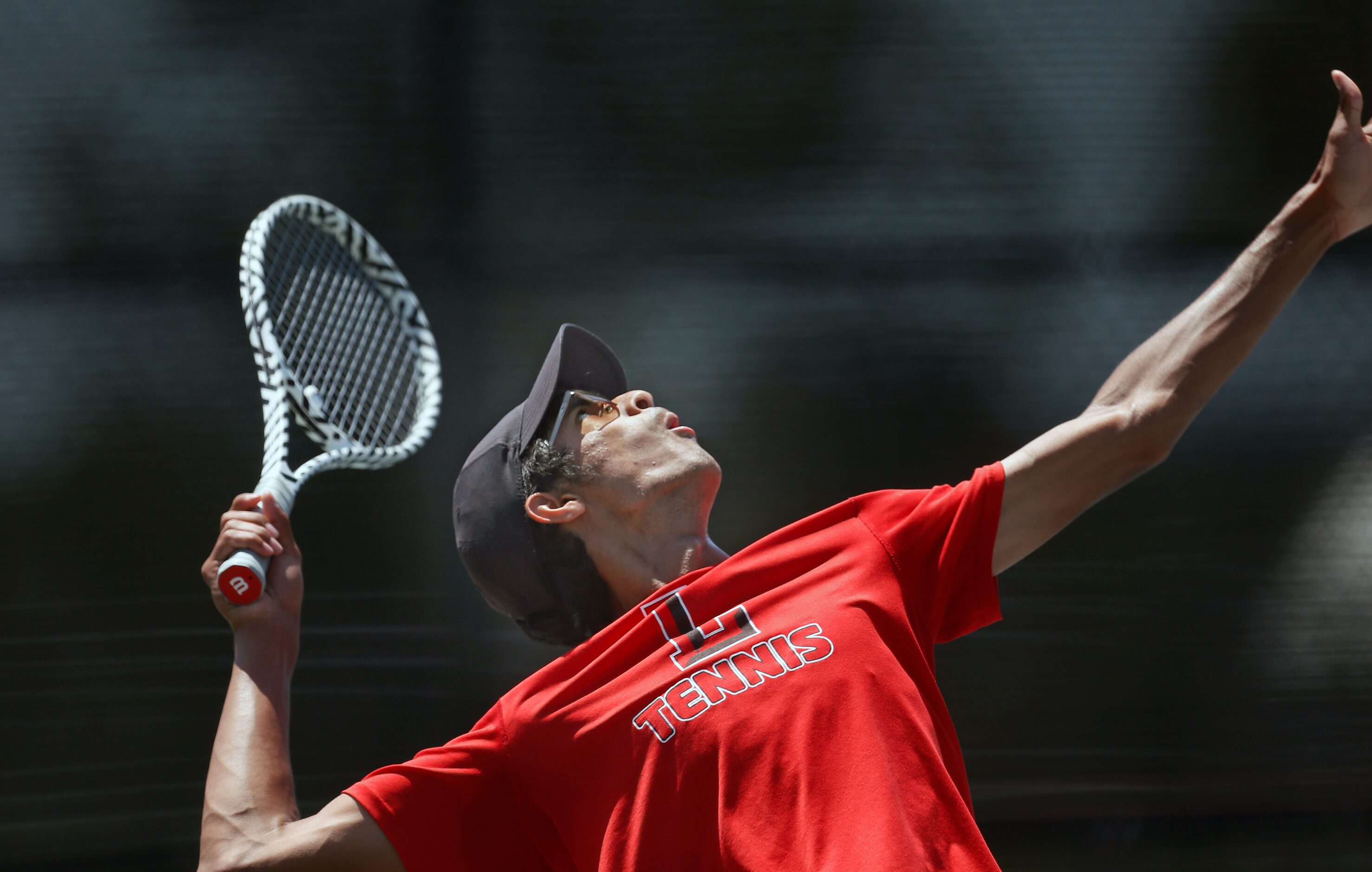 Frisco Liberty's Yatin Pokle serves in 5A mixed doubles match. UIL state tennis semifinals...