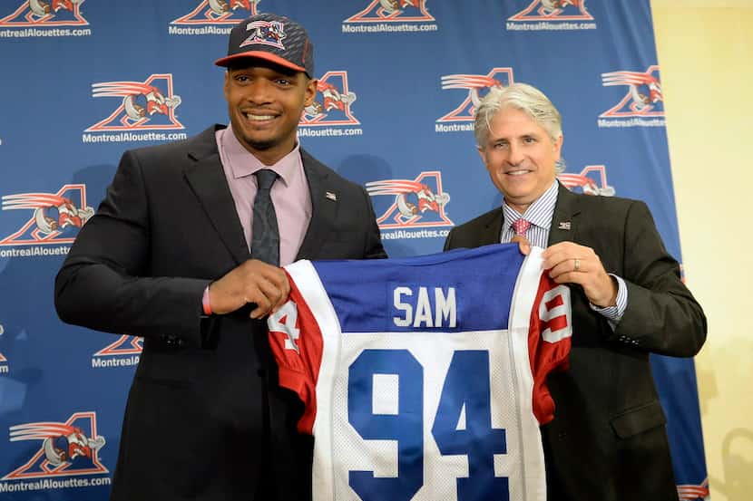 Montreal Alouettes, Canadian Football League team general manager Jim Popp, right, and...