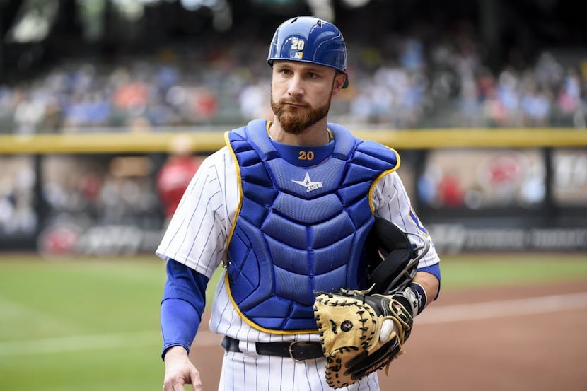 FILE- In this July 29, 2016, file photo, Milwaukee Brewers catcher Jonathan Lucroy gets...