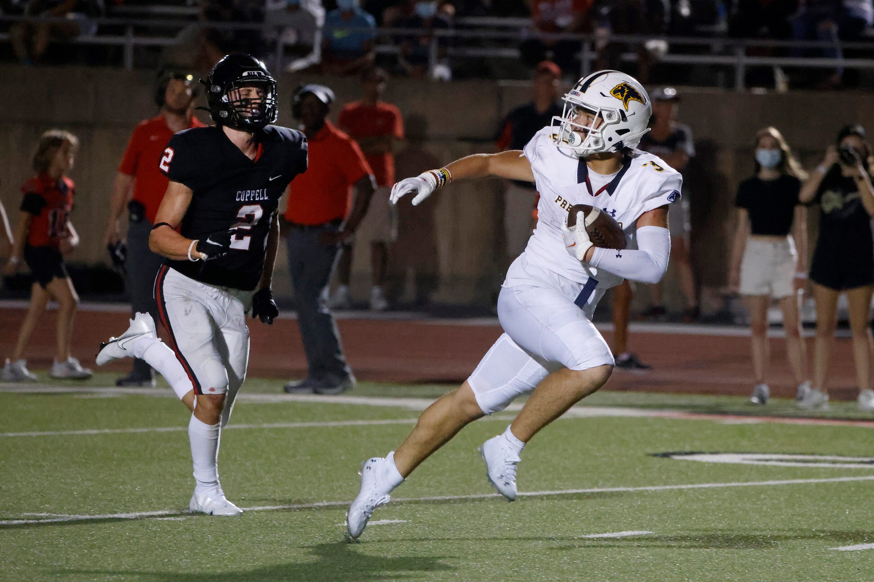 Prestonwood Christian Academy receiver Derek Eusebio (3) runs away form Coppell’s Miles...