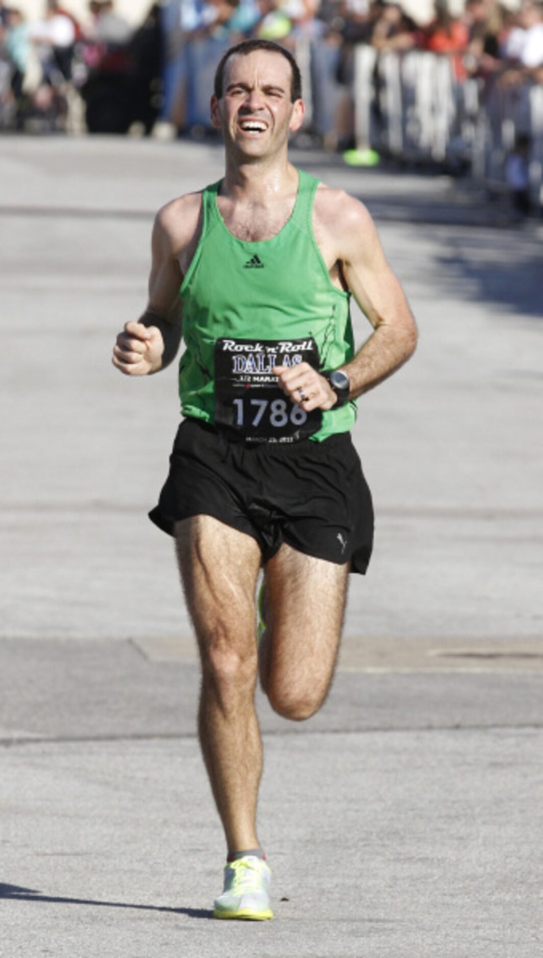 Russell Ingram  runs in the Dallas Rock 'N' Roll half marathon on Sunday, March 25, 2012.