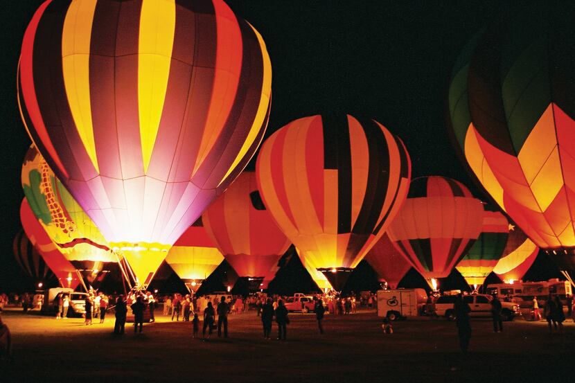 Balloons glow at the annual Plano Balloon Festival.