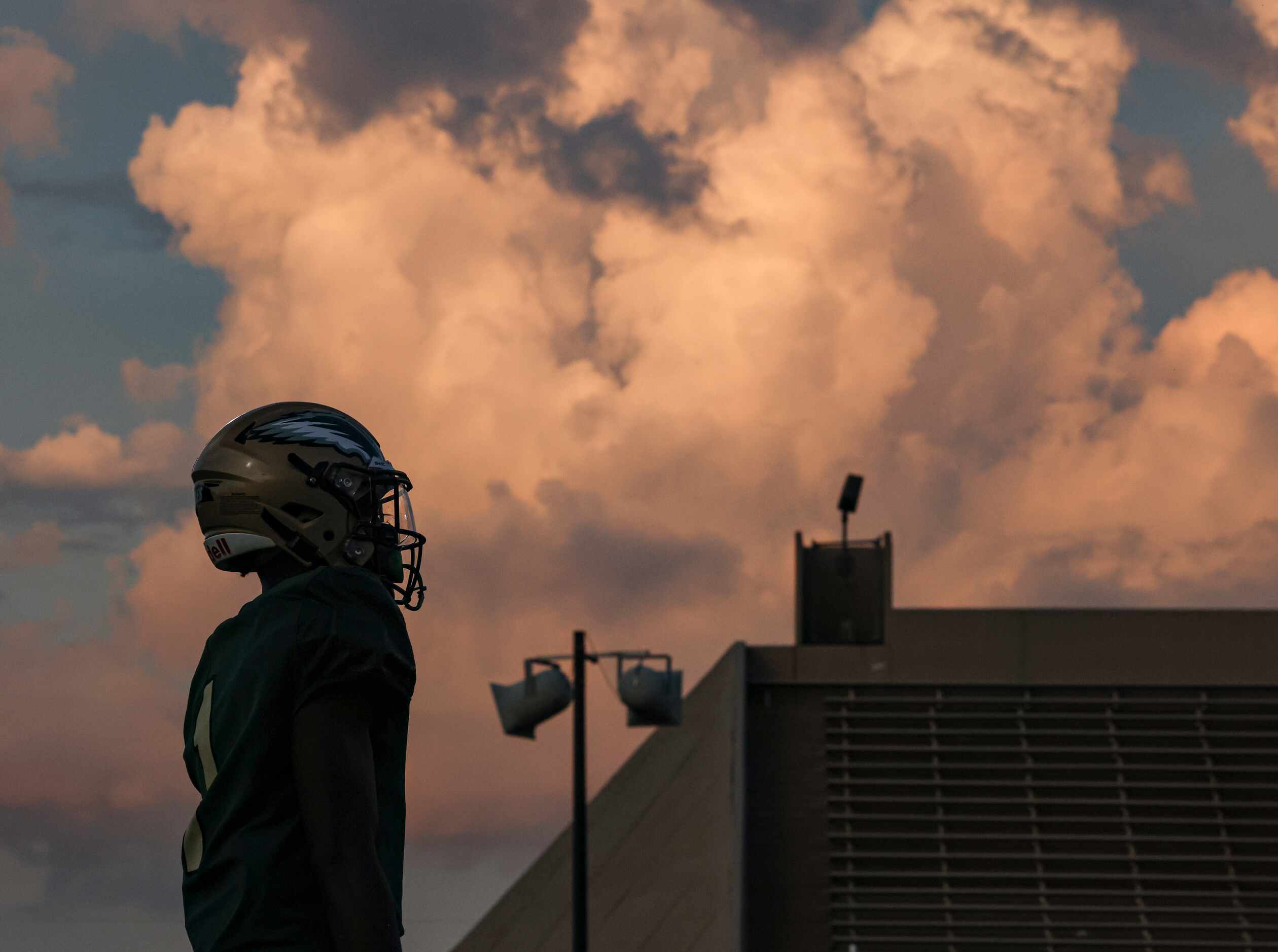 DeSoto High School Johntay Cook II (1) waits for St. Frances Academy to kick the ball at the...