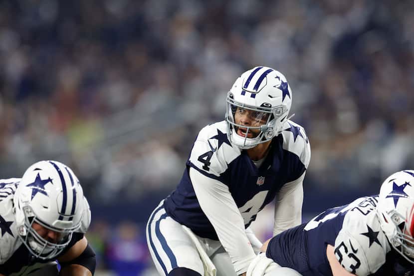 Dallas Cowboys quarterback Dak Prescott (4) lines up under center for the snap during an NFL...