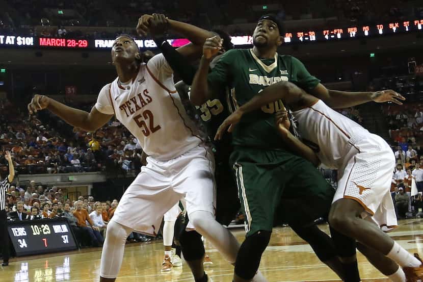 AUSTIN, TX - MARCH 2:  Myles Turner #52 of the Texas Longhorns battles for position with...