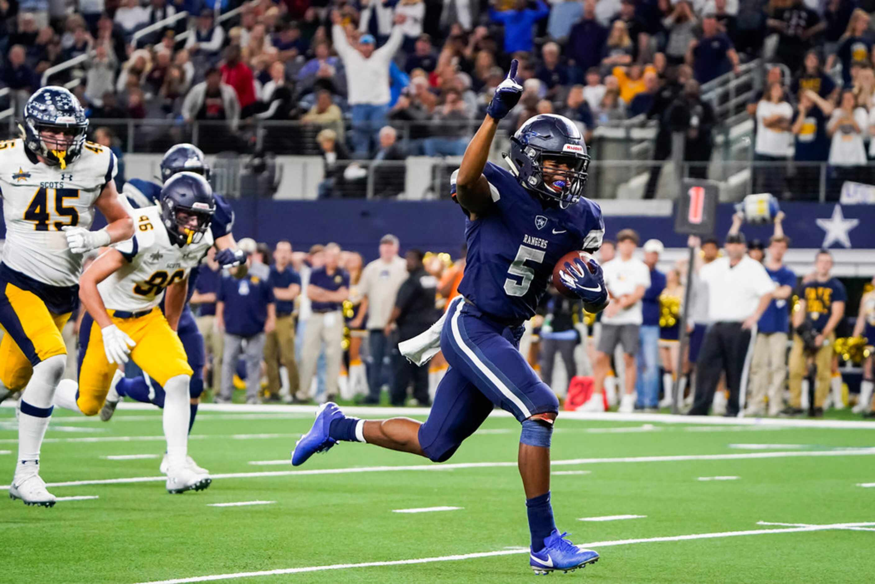 Frisco Lone Star running back Jaden Nixon races to the end zone on an 18-yard touchdown run...