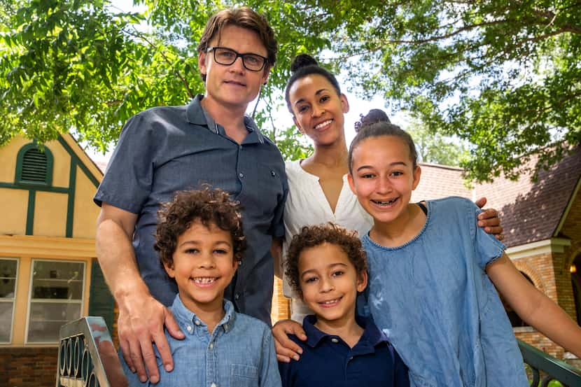 Ryon (back left) and Irie Price posed for a portrait with their children, Gabby (right), 13,...