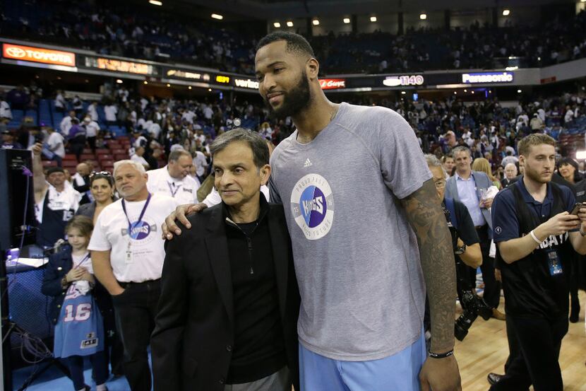 Vivek Ranadive, the majority owner of the Sacramento Kings, is pictured with DeMarcus...