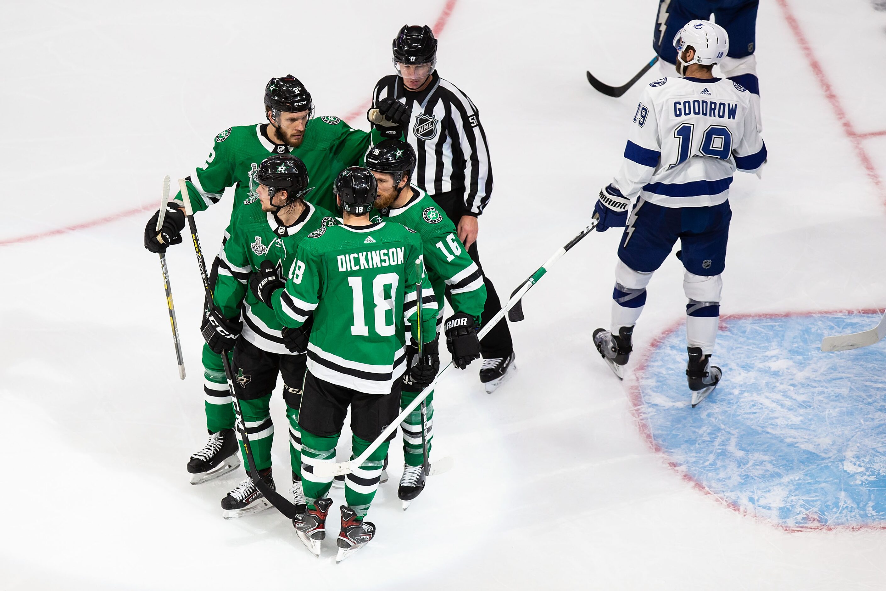 Jamie Oleksiak (2), Miro Heiskanen (4), Jason Dickinson (18) and Joe Pavelski (16) of the...