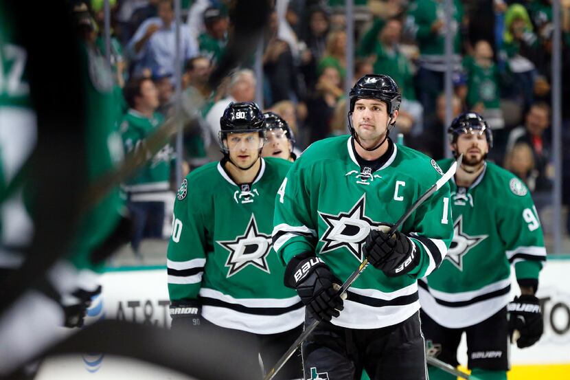 Dallas Stars left wing Jamie Benn (14) skates to the bench after scoring a second period...