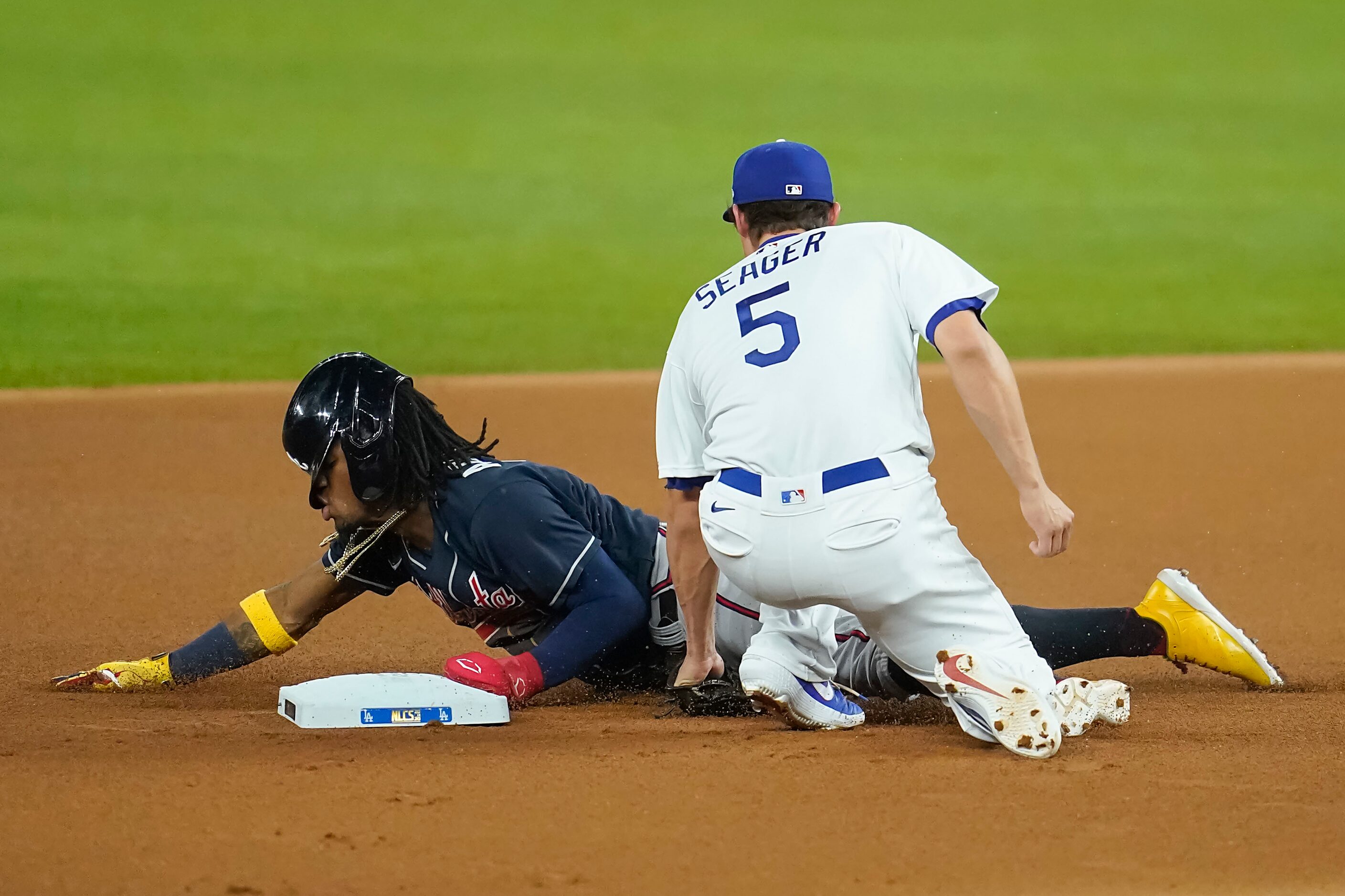 Atlanta Braves right fielder Ronald Acuna Jr. (13) steals second base ahead of the throw to...