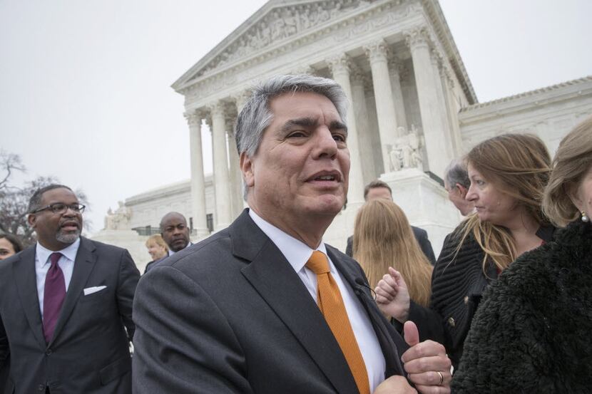 University of Texas president Gregory Fenves, center, has backed Big 12 stability and the...