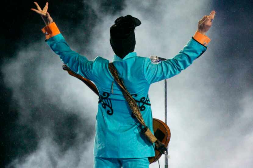 In this Feb. 4, 2007 file photo, Prince performs during the halftime show at Super Bowl XLI...