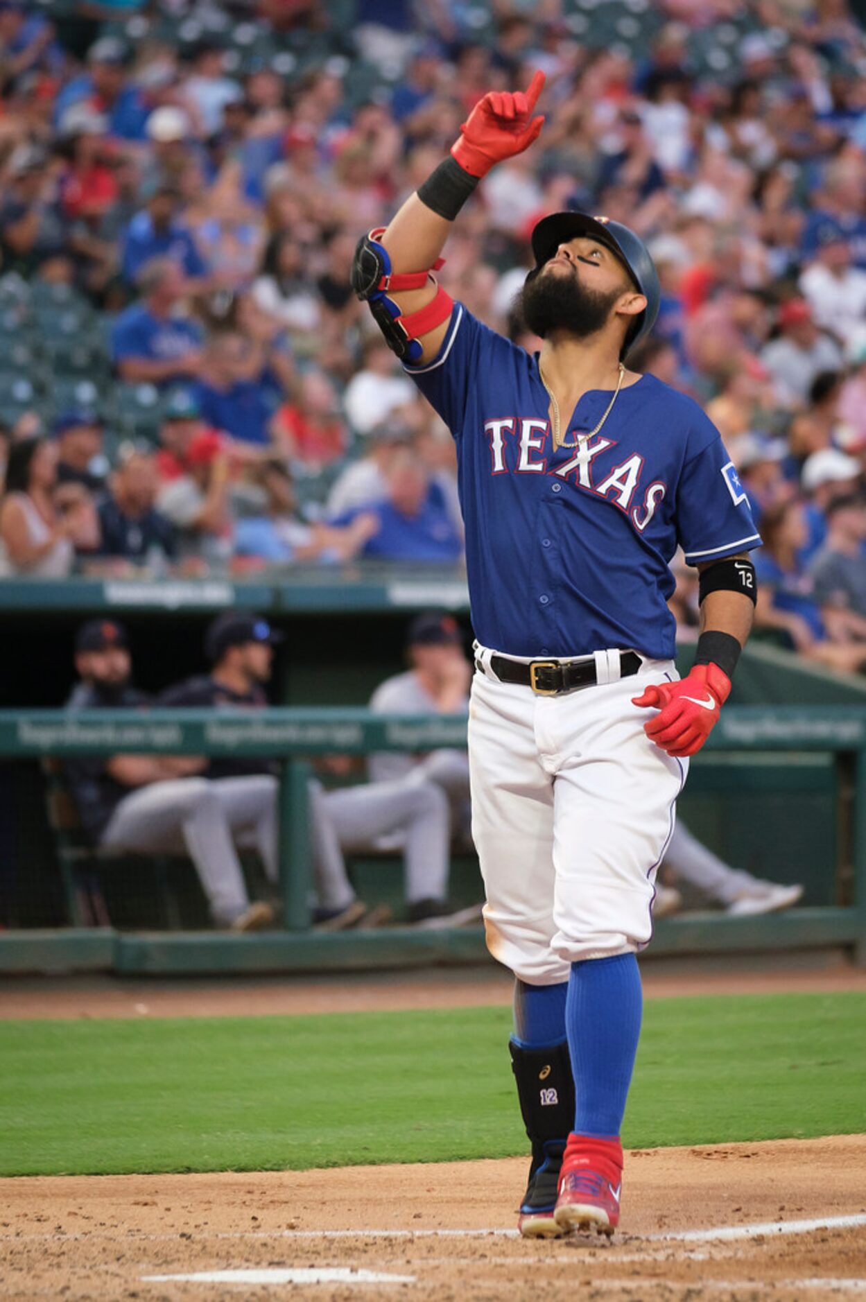 Texas Rangers second baseman Rougned Odor celebrates at home after hitting a solo home run...