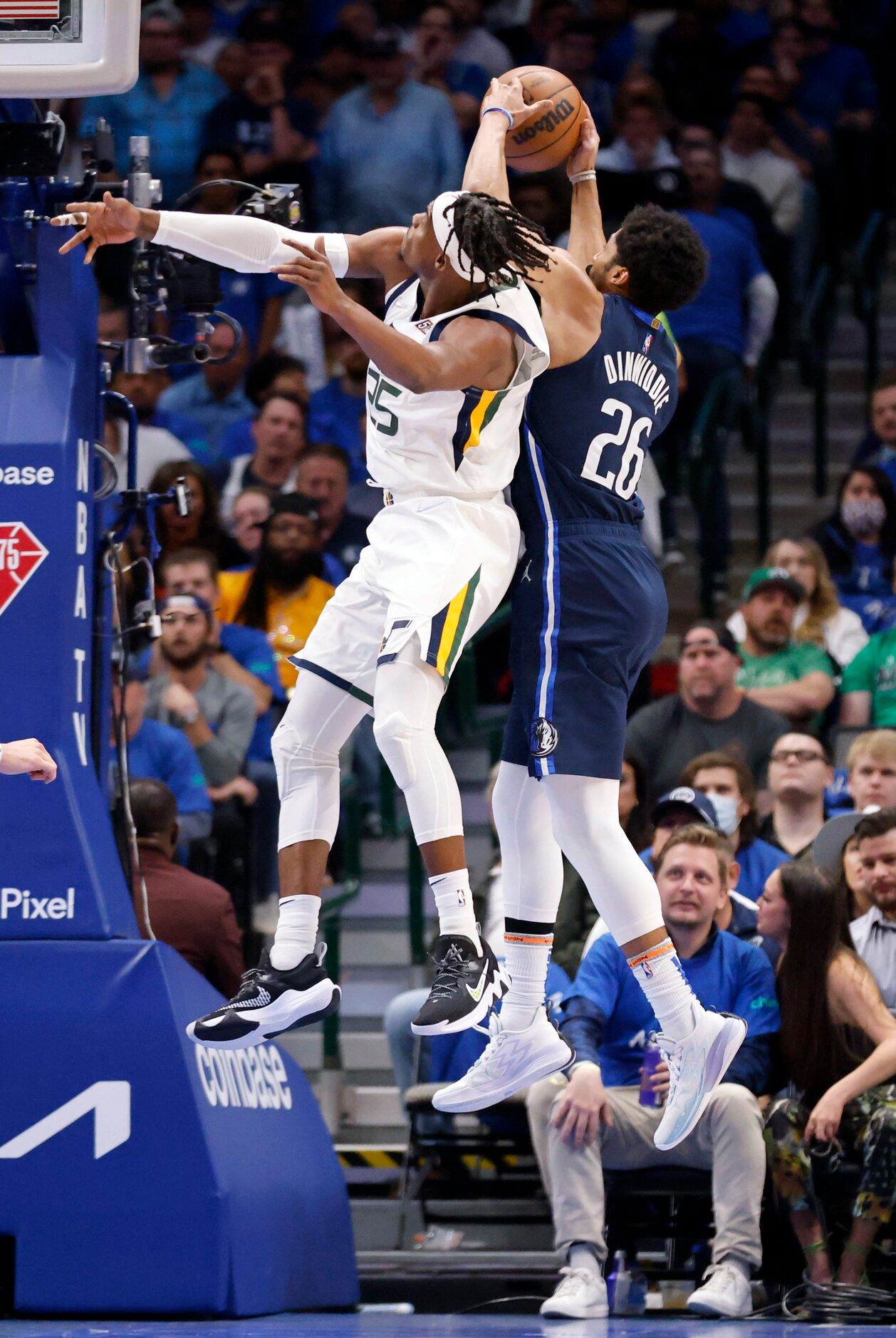 Utah Jazz forward Danuel House Jr. (25) and Dallas Mavericks guard Spencer Dinwiddie (26)...