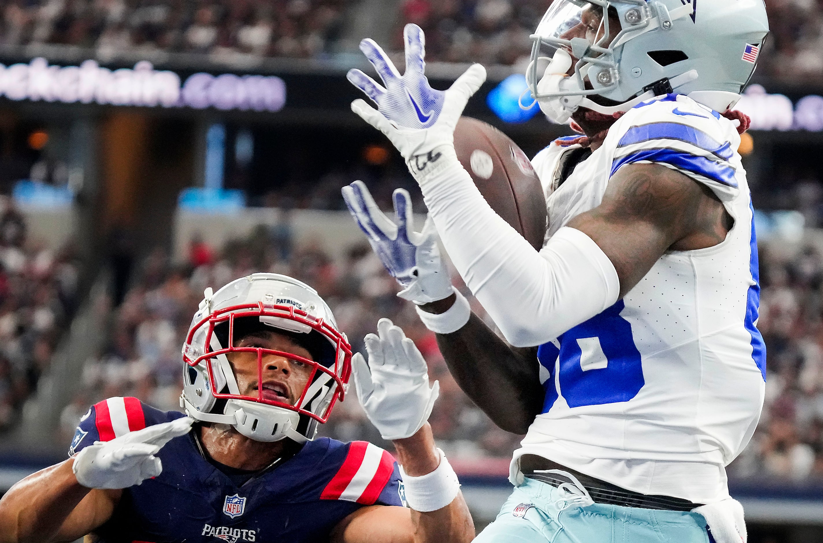 Dallas Cowboys wide receiver CeeDee Lamb (88) catches a touchdown  pass over New England...