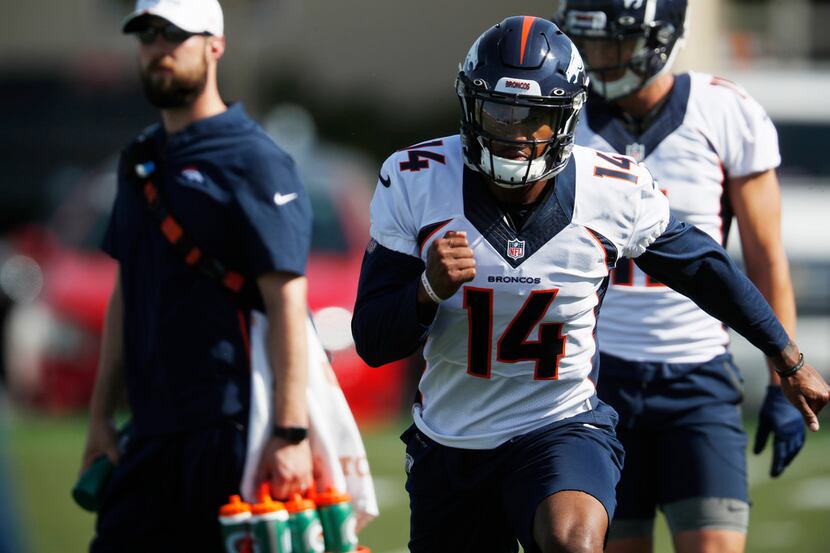 Denver Broncos wide receiver Courtland Sutton takes part in drills during the opening day of...