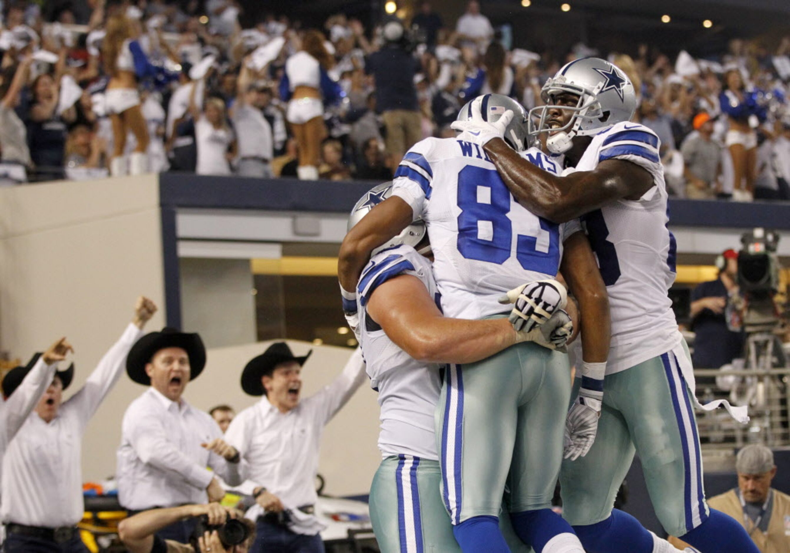 Dallas Cowboys wide receiver Terrance Williams (83) is congratulated by teammates Dallas...