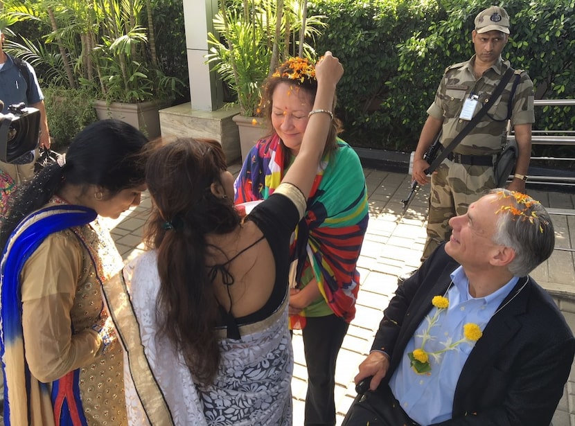 Texas Gov. Greg Abbott and first lady Cecilia Abbott were each given a colored dot, or...