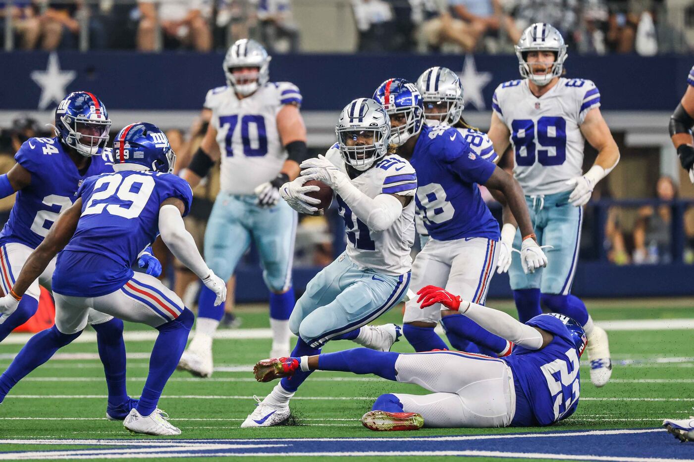 Dallas Cowboys cornerback Anthony Brown (30) celebrates returning a New  York Giants' Mike Glennon pass for