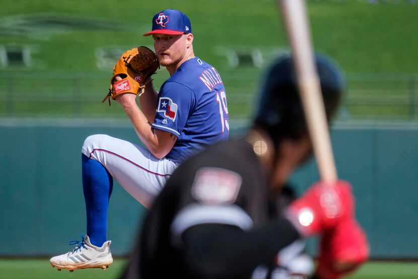 Texas Rangers pitcher Shelby Miller pitches during the first inning of a spring training...