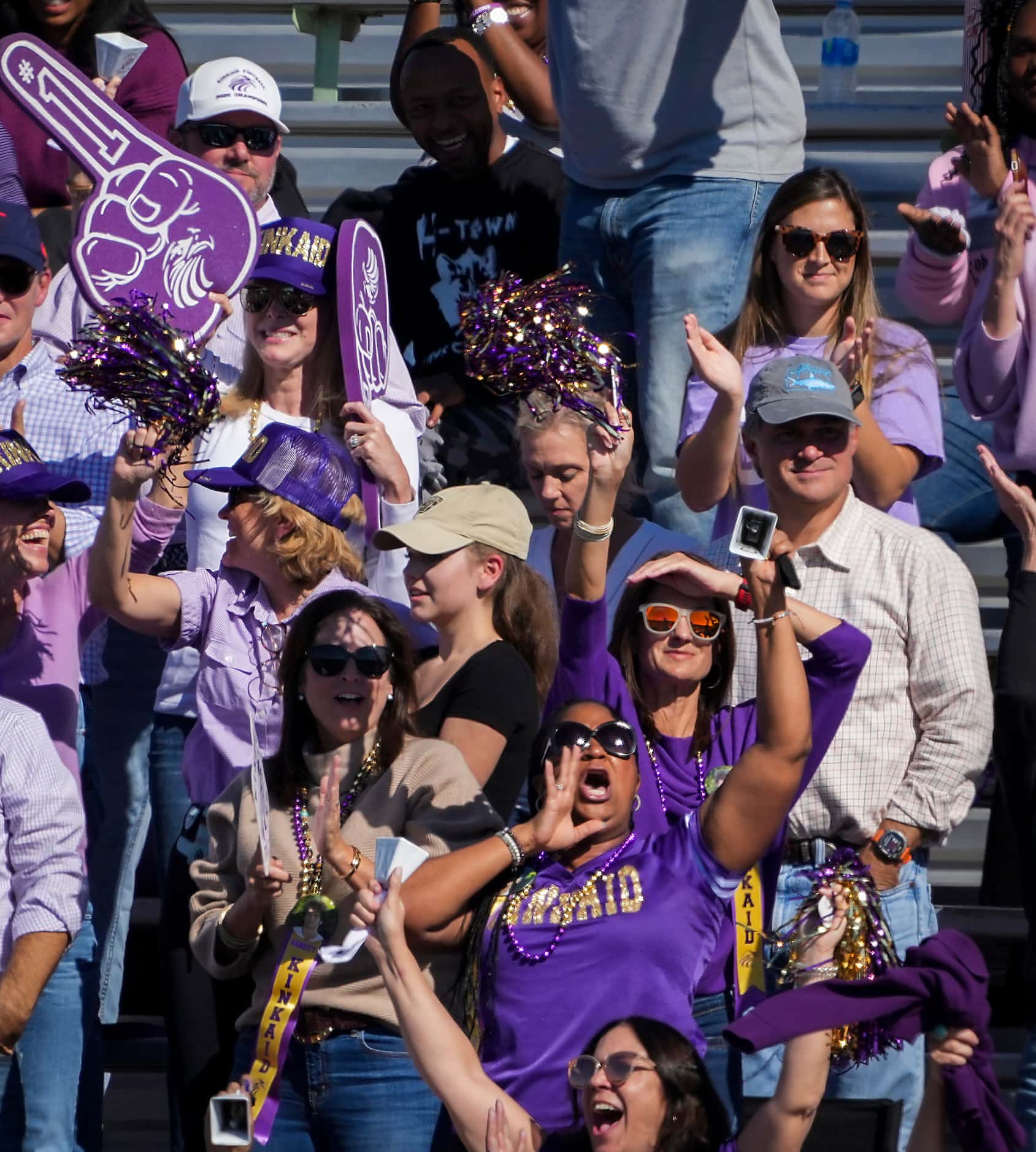 Houston Kinkaid fans cheer a touchdown during the first half of the SPC 4A championship game...