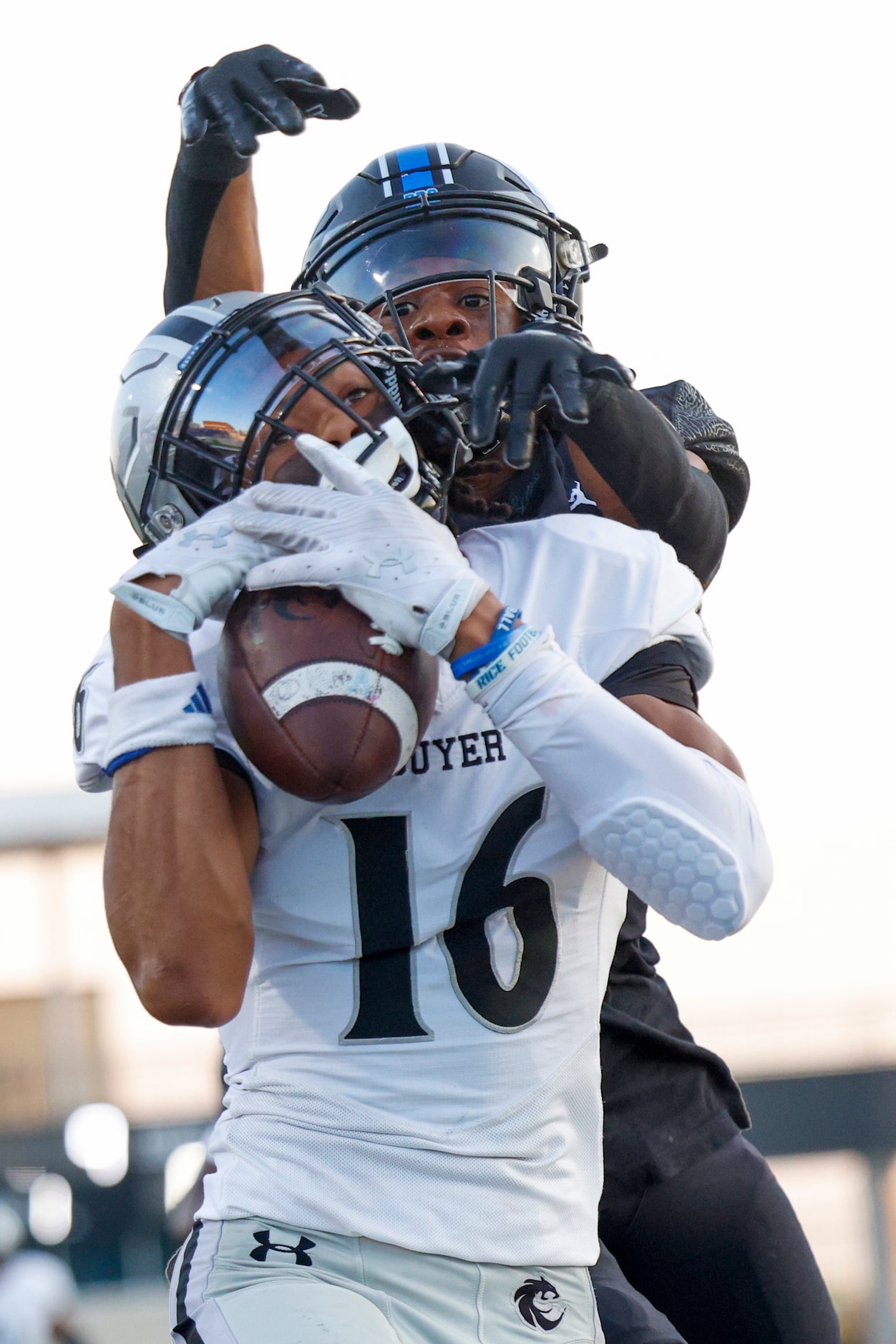 Denton Guyer wide receiver Mason White (16) hauls in a pass for a touchdown ahead of North...