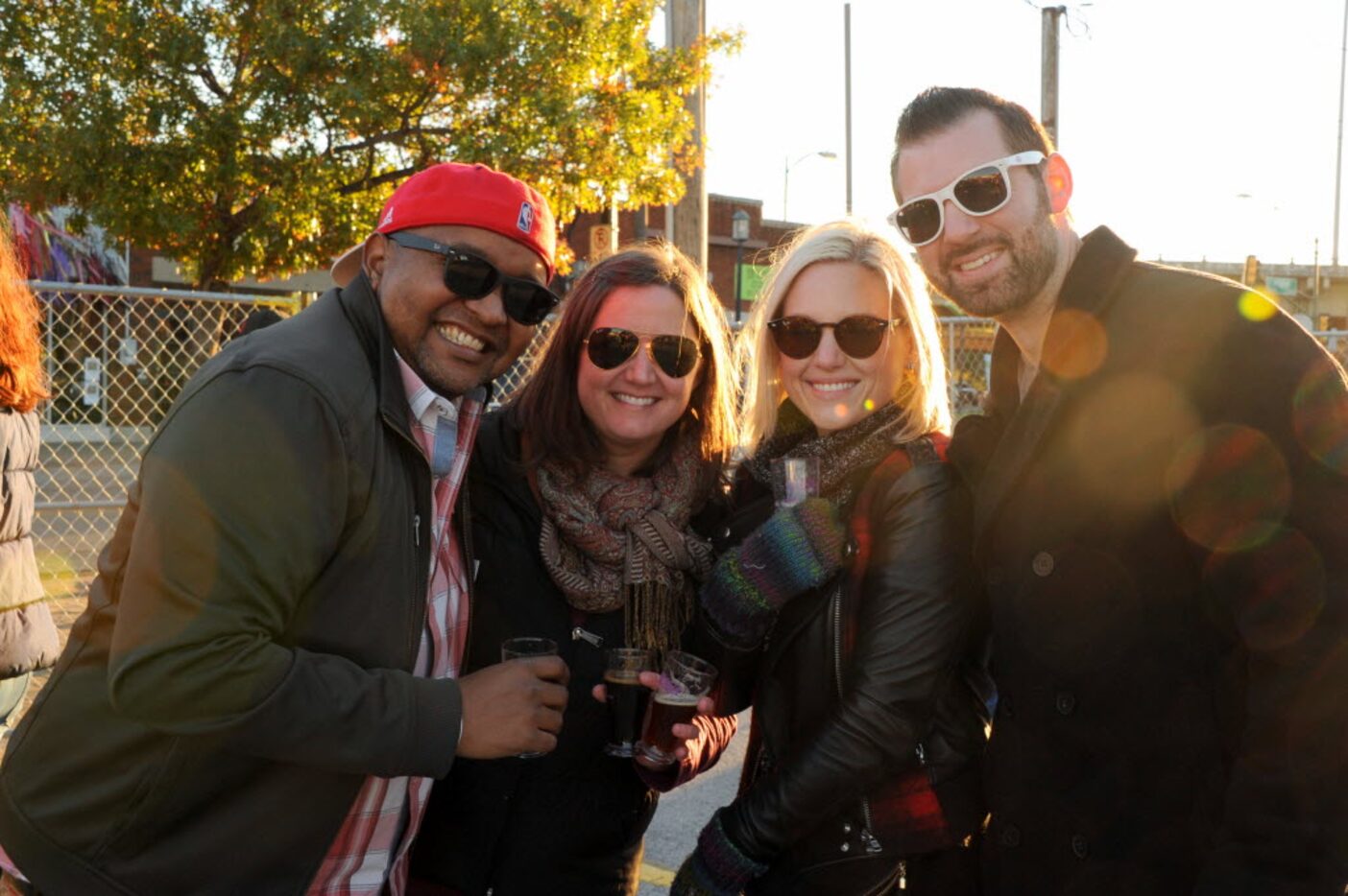 Friends drink craft beer and listen to music at BrainDead Beer Festicle on November 21, 2015. 