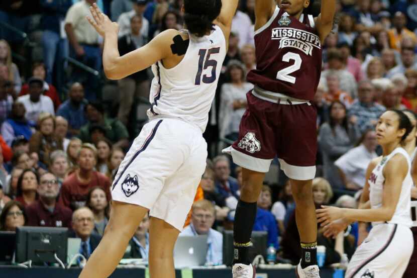 Mississippi State Lady Bulldogs guard Morgan William (2) shoots the go ahead shot over...