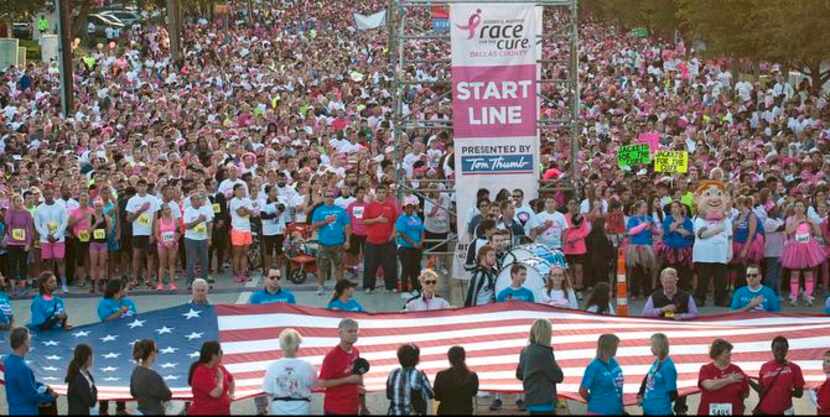 
Participants gathered at the starting line before Saturday’s race. Attendance was 20,000,...