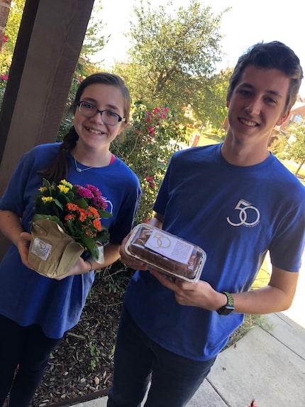 Katie and Cooper delivered flowers and pumpkin bread to friends on Nov. 4, in memory of...