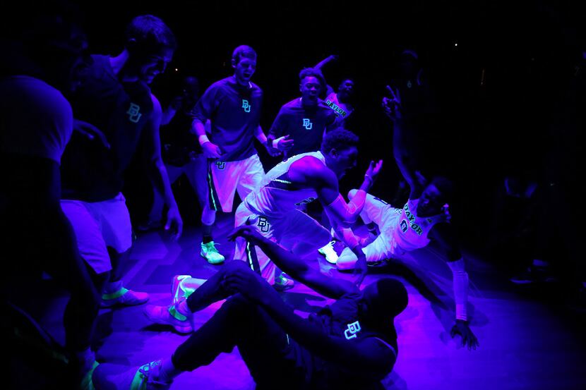 Baylor basketball players dance at mid court befor  their NCAA college basketball game...
