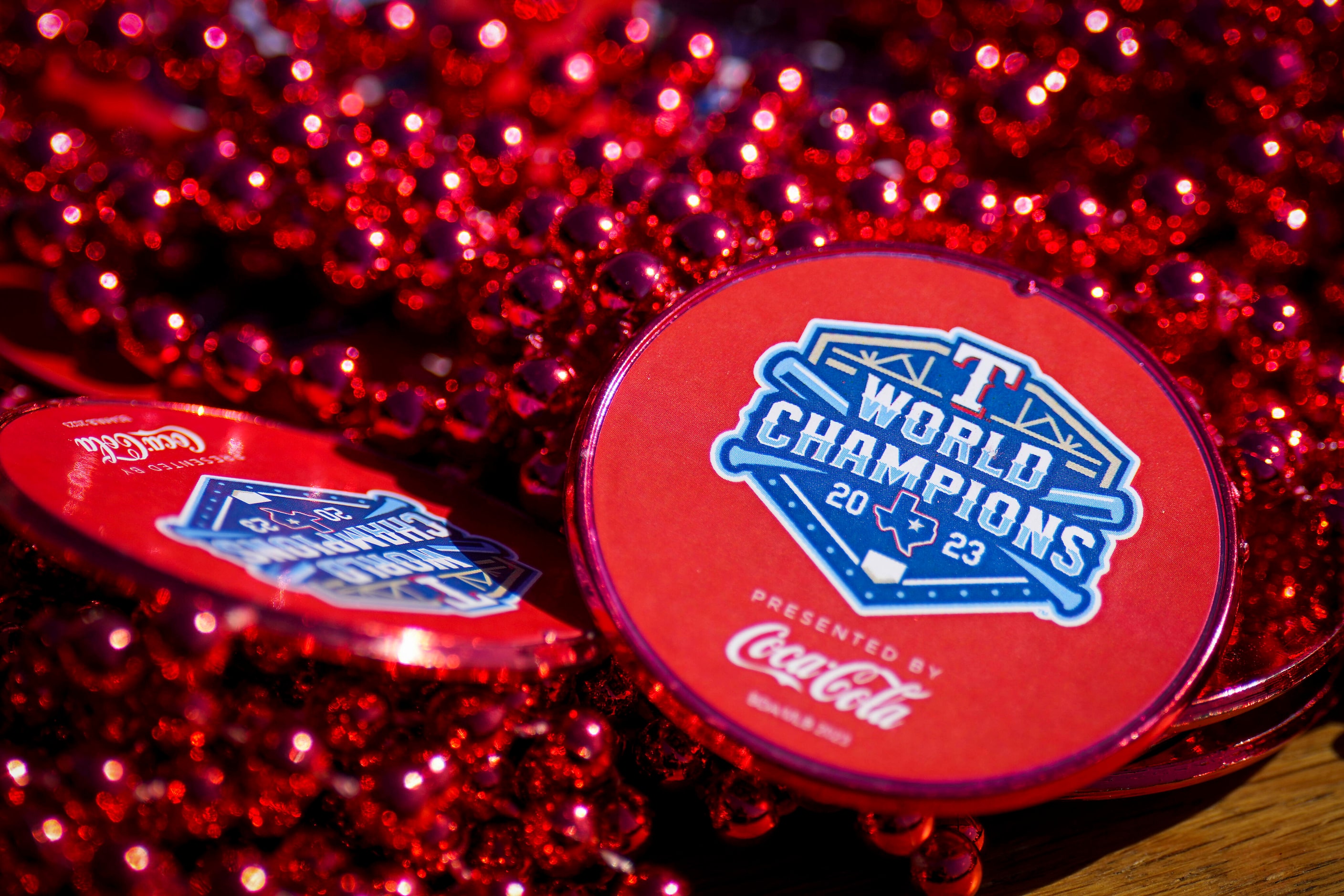 Commemorative parade throws are ready in a player’s truck before the Texas Rangers World...