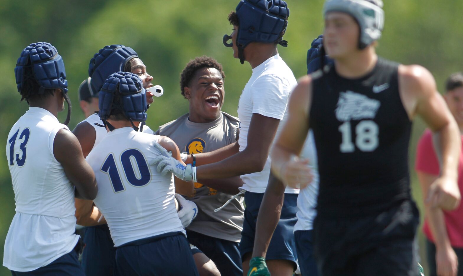 Euphoria erupted on the Little Elm sideline after receiver Dylan Evans (2), with mouthpiece,...