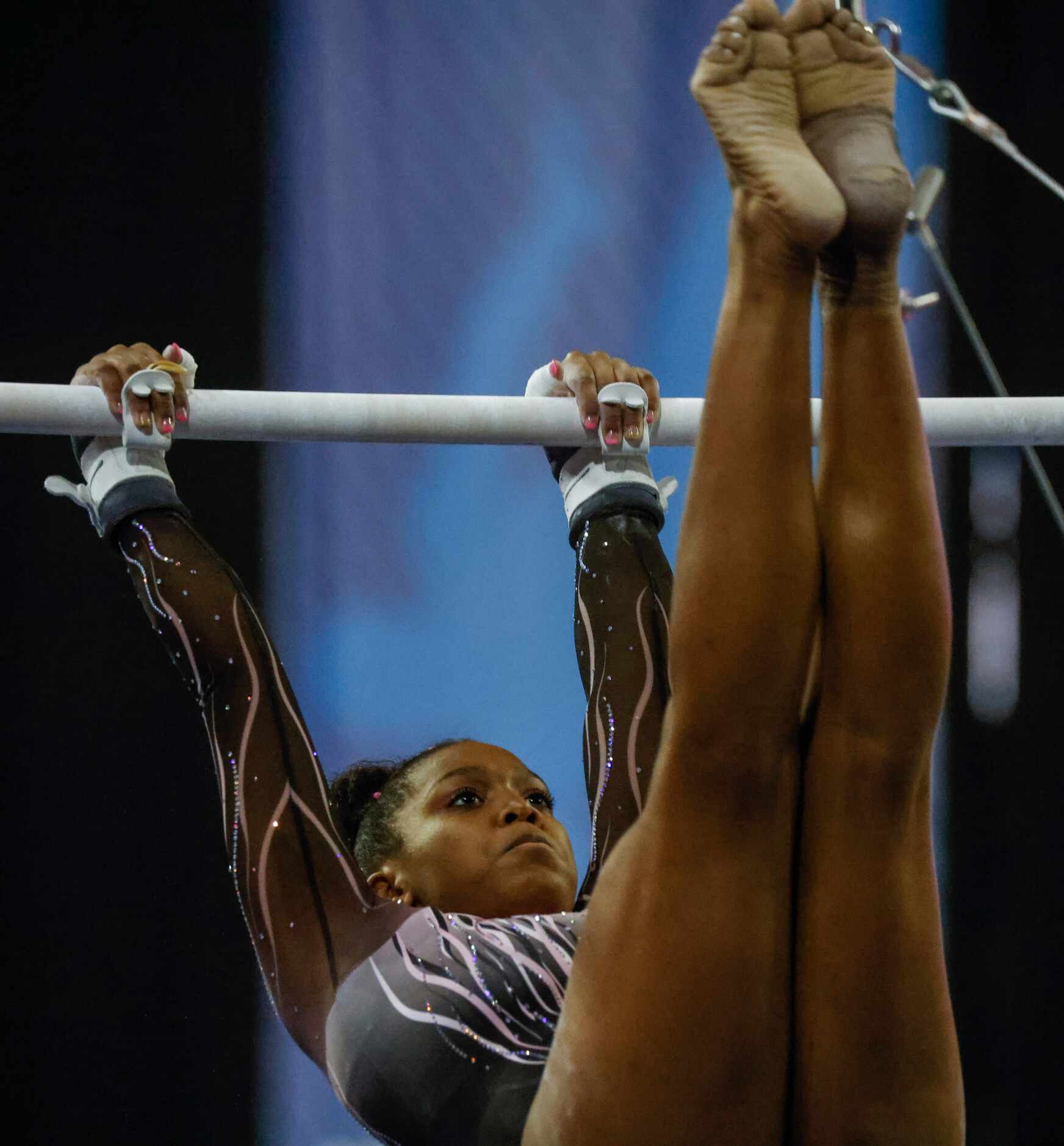 Morgan Price of Texas Dreams, Coppell, Texas competes in uneven parallel bars during Nastia...