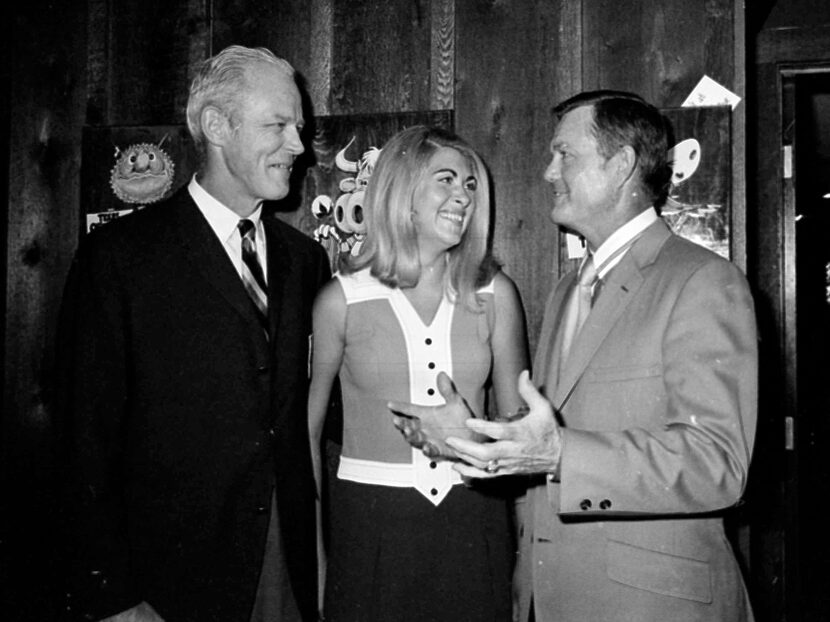 Texas coach Darrell Royal, right, is seen with his former football coach Bud Wilkinson of...