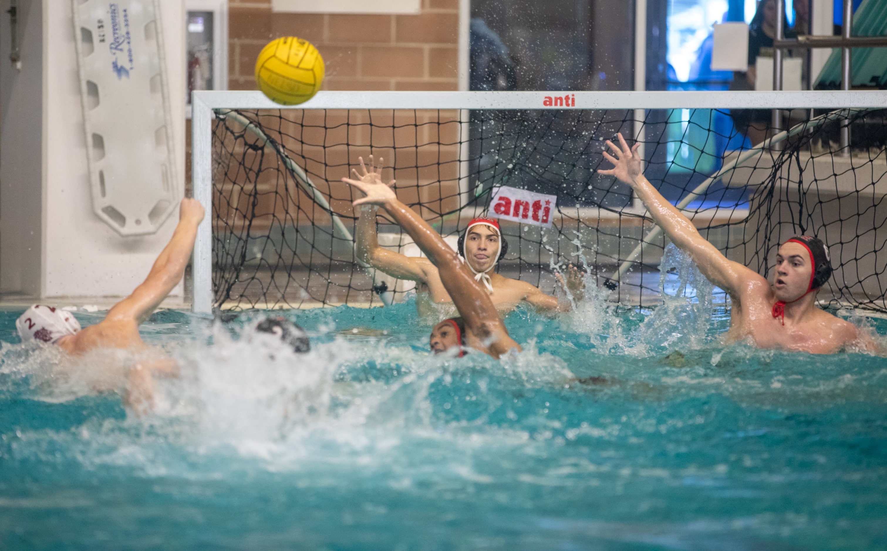 Several Flower Mound Marcus Marauders defend as Clear Creek utility Colton Coney lines up a...