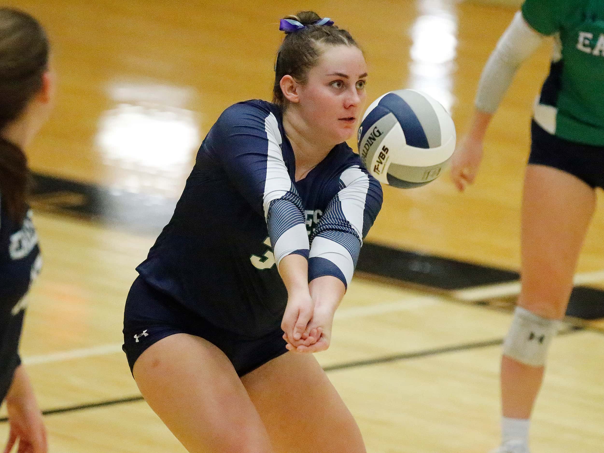 V.R. Eaton High School outside hitter Paige Mooney (3) passes the volleyball during game two...