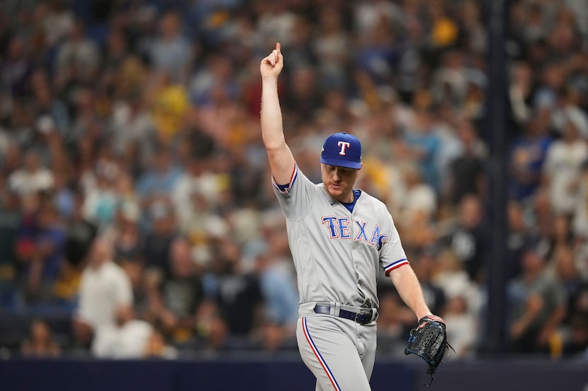 Texas Rangers relief pitcher Josh Sborz reacts as Tampa Bay Rays pinch hitter Junior...