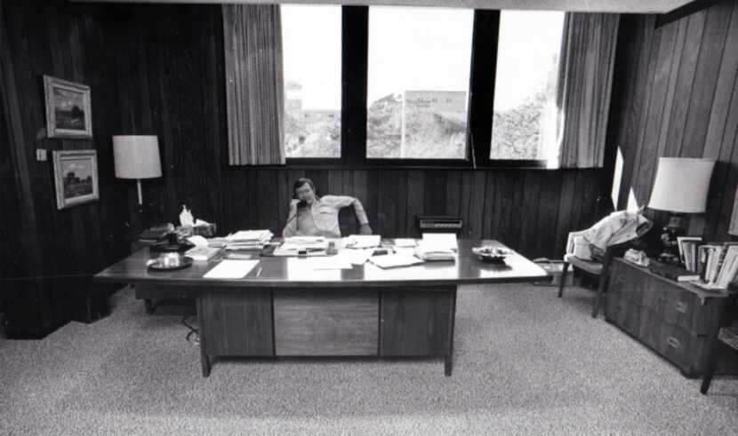 University of Texas football coach Darrell Royal in his office.