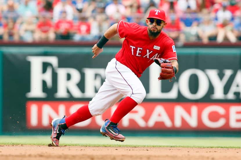 May 15, 2016; Arlington, TX, USA; Texas Rangers second baseman Rougned Odor (12) attempts to...