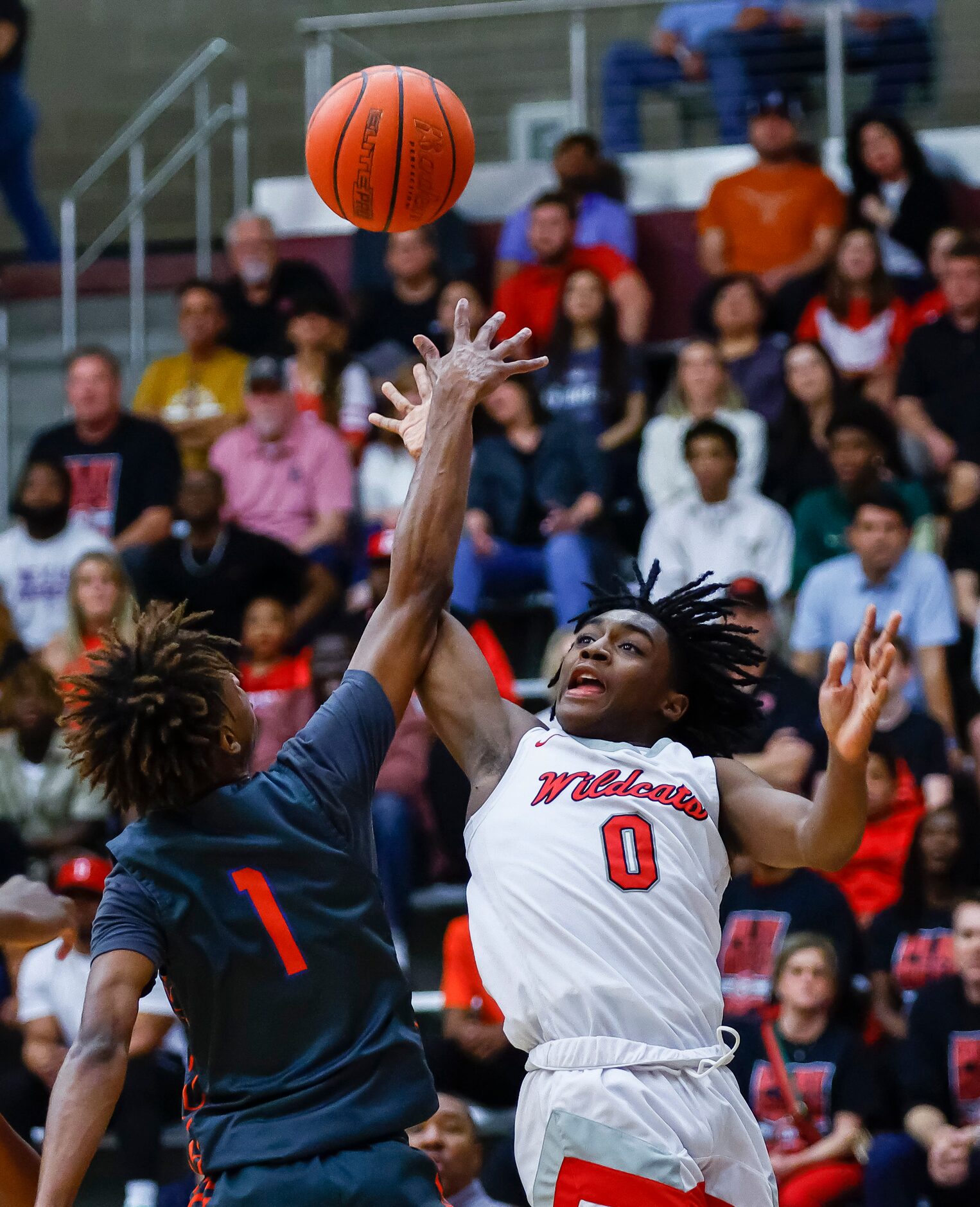 Lake Highlands junior guard Jalen Washington (0) attempts a shot as Arlington Bowie...