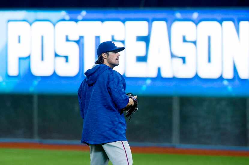 Texas Rangers starting pitcher Cole Hamels takes part in a baseball practice in Toronto,...