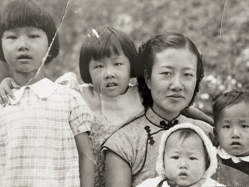 Tom Huang's grandmother poses for a family photo with four of her children in 1939 at the...