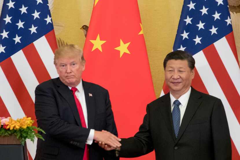 President Donald Trump and Chinese President Xi Jinping shook hands last year during a joint...