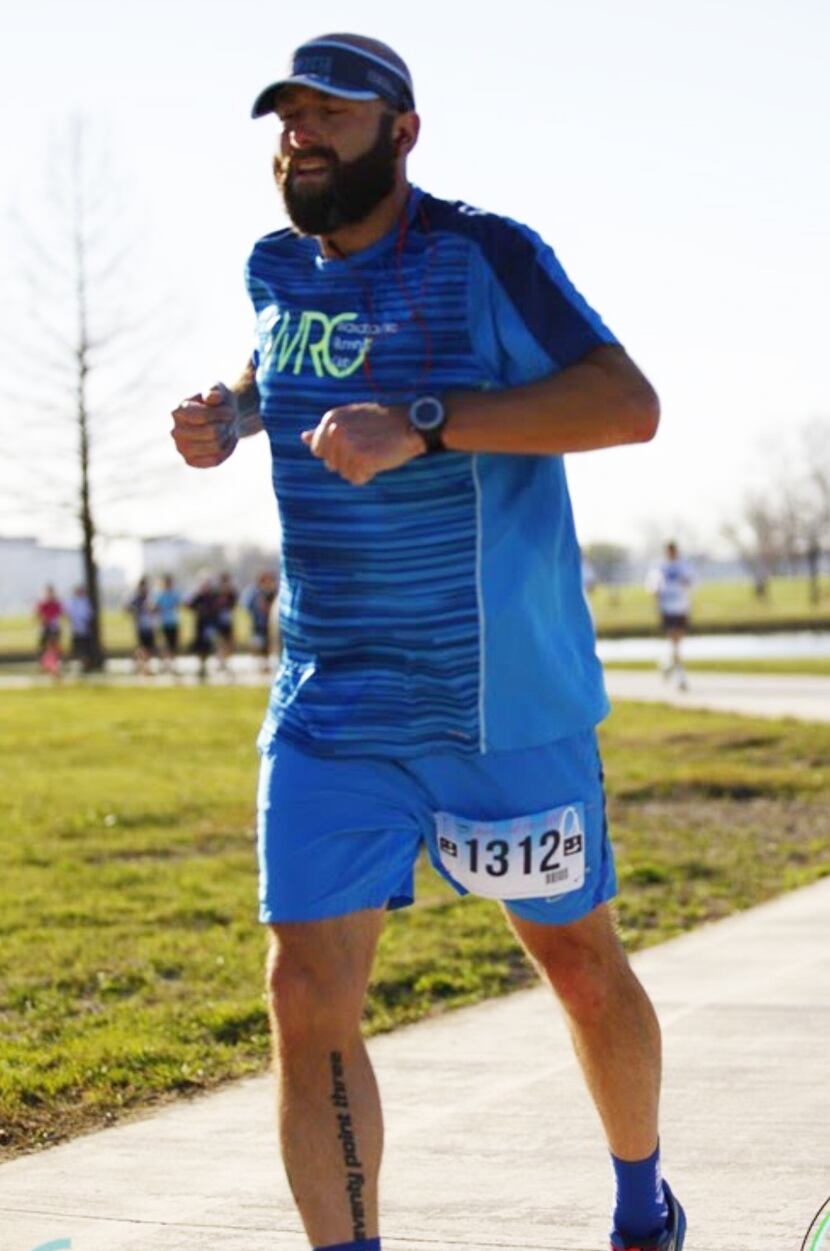 Cedar Hill's David Martin, running the 2016 Trinity River Levee Run, shows his "seventy...