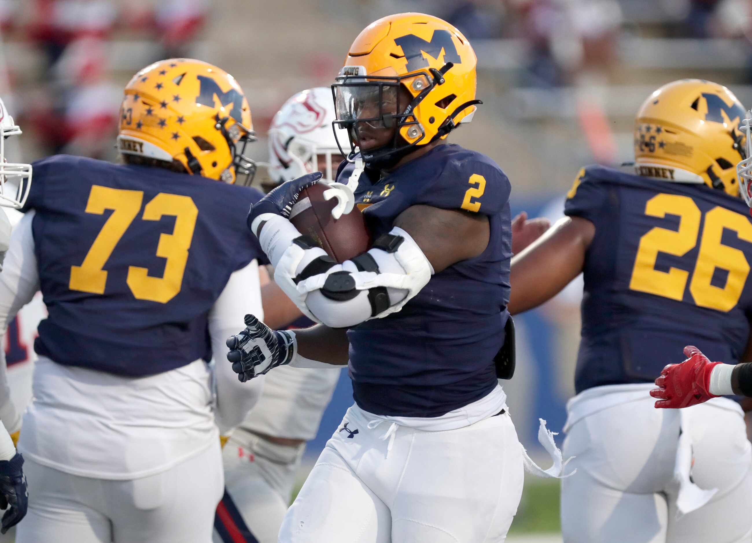 McKinney High School running back Bryan Jackson (2) goes untouched into the end zone for the...